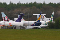 Lasham Airfield - storage area at Lasham, three former BMI Baby B737's at the rear and from L to R are N217FE Boeing 727 2S2F, VP-BVU Boeing 737-5Q8, N279CS	Boeing 737-33V and M-FAHD	Boeing 727-76 - by Chris Hall