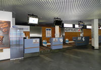 Antwerp International Airport - Check In Counter for  CityJet and BMI Regional flights. - by Henk Geerlings
