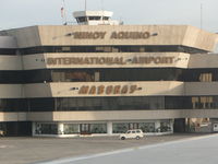 Ninoy Aquino International Airport - Terminal 1 as seen from Delta flight No.629 Manila - Nagoya - Detroit. Gary W Ballard photo Sept. 2010 - by Gary W Ballard