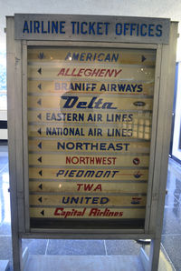 Ronald Reagan Washington National Airport (DCA) - Airline signs from the past at National Airport.  Of the 12 airlines, only American, Delta and United remain. - by Ronald Barker