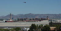 Mc Carran International Airport (LAS) - Overlooking the Airport from the West, with the new Tower and the Mountains in the background - by A. Gendorf