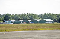 Blackbushe Airport - New hangarage in place in aircraft park - by OldOlympic
