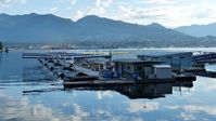 Vancouver Harbour Water Airport (Vancouver Coal Harbour Seaplane Base), Vancouver, British Columbia Canada (CYHC) - Early Sunday morning overlooking Harbour Air terminal in Coal Harbour.  The North Shore mountains line the background. - by M.L. Jacobs