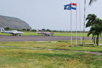 F.D. Roosevelt Airport – Sint Eustatius, Netherlands Antilles,  Netherlands Antilles (TNCE) - Some private aircraft on parking positions at EUX. - by Tomas Milosch