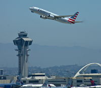Los Angeles International Airport (LAX) - American Airlines (N804NN) is departing between the Tower and the Tom Bradley Building - by A. Gendorf