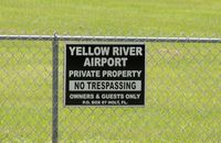 Yellow River Airstrip Airport (FD93) - SIGN ON FENCE AT AIRPORT - by dennisheal