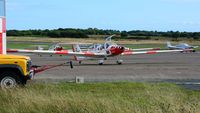 Swansea Airport, Swansea, Wales United Kingdom (EGFH) - Three Air Cadets motor gliders on the apron at Swansea Airport. - by Roger Winser