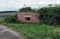 EGOP Airport - Type 24 Pillbox installed to guard the rear of the bomb dump. - by Derek Flewin