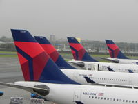 Amsterdam Schiphol Airport, Haarlemmermeer, near Amsterdam Netherlands (EHAM) - Delta  Tails at Schiphol Airport  - by Henk Geerlings