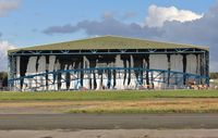 Bournemouth Airport, Bournemouth, England United Kingdom (EGHH) - Building screen for hangar extension shredded in violent storm - by John Coates