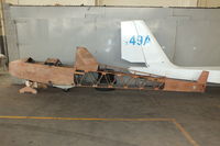 EGDD Airport - unidentified glider fuselage in the hangar at Bicester - by Chris Hall