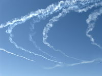 Camarillo Airport (CMA) - Warbirds in turning echelon flight with smoke - by Doug Robertson
