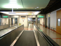 London Gatwick Airport - Moving sidewalks at the Gatwick Airport outside London England - by Ron Coates