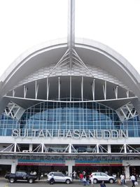 Hasanuddin Airport - Sultan Hasanuddin International Airport, Makassar, South Sulawesi - Indonesia. Exterior / Drop Off area of the Terminal building - by NN