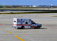 Chicago O'hare International Airport (ORD) - Ambulance on the O'Hare ramp - by Ronald Barker