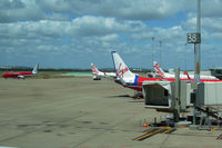 Brisbane International Airport, Brisbane, Queensland Australia (YBBN) - Old Virgin Blue and new Virgin Australia liveries - by Micha Lueck
