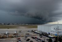 Miami International Airport (MIA) - Looking southwest over MIA, strong storm rolls in off of the ocean over Coral Gables, Westchester and Fountainebleau before hitting MIA - by Florida Metal