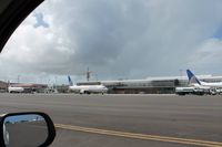 VC Bird International Airport - United line up  - by All rights reserved to photographer