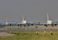 London Heathrow Airport - The queue for 27L - by John Coates