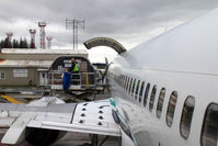 Merle K (mudhole) Smith Airport (CDV) - Combi-freighter B737 unloading at Cordova, AK - by Pete Hughes