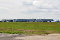 Newcastle Airport - Newcastle airport's terminal buildings viewed from the south side of the runway. May 14 2014. - by Malcolm Clarke
