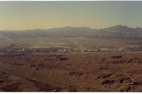 Laughlin/bullhead International Airport (IFP) - Picture on downwind of Bullhead City airport in 1992. View is to the west and Laughlin,Nevada (casinos) across the river. Runway is barely seen in this picture. - by S B J