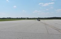 Weedon Field Airport (EUF) - LOOKING OUT FROM FRONT OF OFFICE TO TAXIWAY TO RUNWAY - by dennisheal