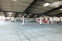 Goodwood Airfield - inside the main hangar at Goodwood - by Chris Hall