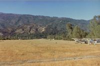 Gravelly Valley Airport (1Q5) - Right down the runway to the north and several visiting aircraft which included a Cessna 310. This 310 pilot put on a little airshow which was very impressive to say the least! Notice pickup crossing runway so be prepared when landing for this possibility - by S B J