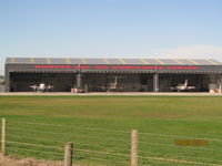Napier Airport - air ambulance hangar visible from layby on main road - by magnaman