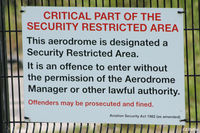 Manchester Airport, Manchester, England United Kingdom (EGCC) - Sign on fence at Manchester EGCC - you have been warned ! - by Clive Pattle