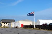 SFAL Airport - The easternmost corner of the main apron with the FIGAS (Falkland Islands Government Air Service) HQ building in the rear - by Clive Pattle