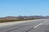 SFAL Airport - A long view of the town of Port Stanley taken from the airfield (SFAL). Such is the clarity of the air in the South Atlantic that it is difficult to judge distance. For example the mountains in the background are at least 12km away. - by Clive Pattle