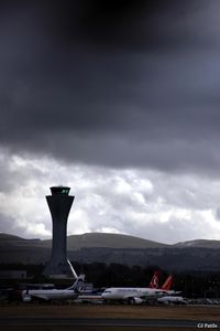 Edinburgh Airport, Edinburgh, Scotland United Kingdom (EGPH) - A storm looms over Edinburgh airport - by Clive Pattle
