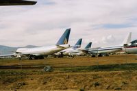 Mojave Airport (MHV) - Aircraft at Mojave storage. N17025 is the nearest 747. A 1973 747 238B. - by S B J