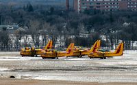 Winnipeg James Armstrong Richardson International Airport (Winnipeg International Airport) - Several Canadair CL-415s owned by the Province of Manitoba parked for the winter. - by Kreg Anderson