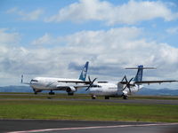Auckland International Airport, Auckland New Zealand (NZAA) - ZK-NCJ and ZK-MCU racing along taxyway - by magnaman