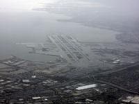 San Francisco International Airport (SFO) - Heavy rain at SFO - by Micha Lueck