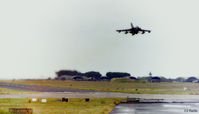 RAF Leuchars - A Tornado GR.4 over the airbase at RAF Leuchars with the 111 Sqn buildings in the background. - by Clive Pattle