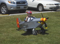 Santa Paula Airport (SZP) - P-51 MUSTANG Pedal Plane-3-4 year old power, tough taxi on deep grass runway, plans-built by Dad - by Doug Robertson