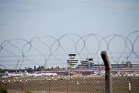 Tegel International Airport (closing in 2011), Berlin Germany (EDDT) - View thru the fence to apron.... - by Holger Zengler