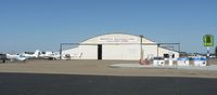 Tracy Municipal Airport (TCY) - One of the oldest and largest hangars at Tracy Municipal Airport, Skyview Aviation's hangar is the main FBO at Tracy. - by Chris L.