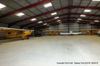 Oaksey Park Airport - one of the hangars at Oaksey Park - by Chris Hall