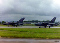 RAF Lossiemouth Airport, Lossiemouth, Scotland United Kingdom (EGQS) - A pair of Tornado GR.1's lined up for take off at RAF Lossiemouth EGQS. On the left is a 617 Sqn and on the right a 15 R Sqn machine. - by Clive Pattle