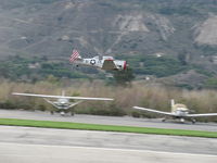 Santa Paula Airport (SZP) - Condor Squadron making high speed pass at flour bombing target in Santa Clara River-bed Commemorating the attack of 7 Dec. 1941 on Pearl harbor. Excuse this grab shot; unprepared for the setup. - by Doug Robertson