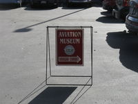Santa Paula Airport (SZP) - Aviation Museum directional sign. Open First Sundays 10-3, rain cancels - by Doug Robertson