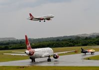 Edinburgh Airport, Edinburgh, Scotland United Kingdom (EGPH) - Virgin A320-214 EI-DEO Landing runway 06 while Virgin A320 EI-EZW And Hunter G-PSST Hold  - by Mike stanners