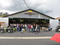 Santa Paula Airport (SZP) - Pat Quinn's Museum Hangar-on the occasion of his receiving the FAA Master Pilot Award for 50 years accident free-no violations flying. The well-attended luncheon ceremony guests dispersing from a great party! - by Doug Robertson