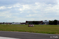 Cranfield Airport - Airport buildings at Cranfield EGTC, Bedfordshire, UK viewed from the runway - by Clive Pattle