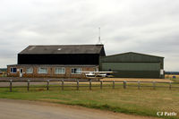 Peterborough/Sibson Airport - A view of the HQ building, Tower and one of the hangars at Sibson EGSP - by Clive Pattle